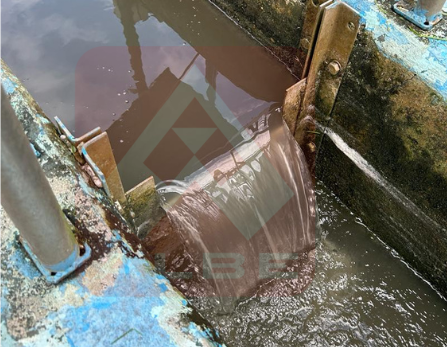 Turbid untreated water with suspended particles before coagulation in the water treatment process.