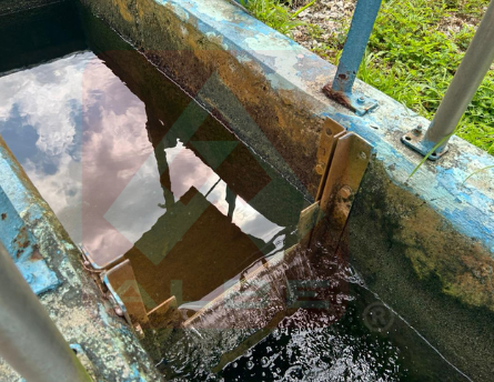 Clear water after coagulation and flocculation, showing reduced turbidity and removed contaminants.